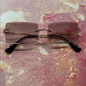 Stylish Black and Gold Rimless Sunglasses